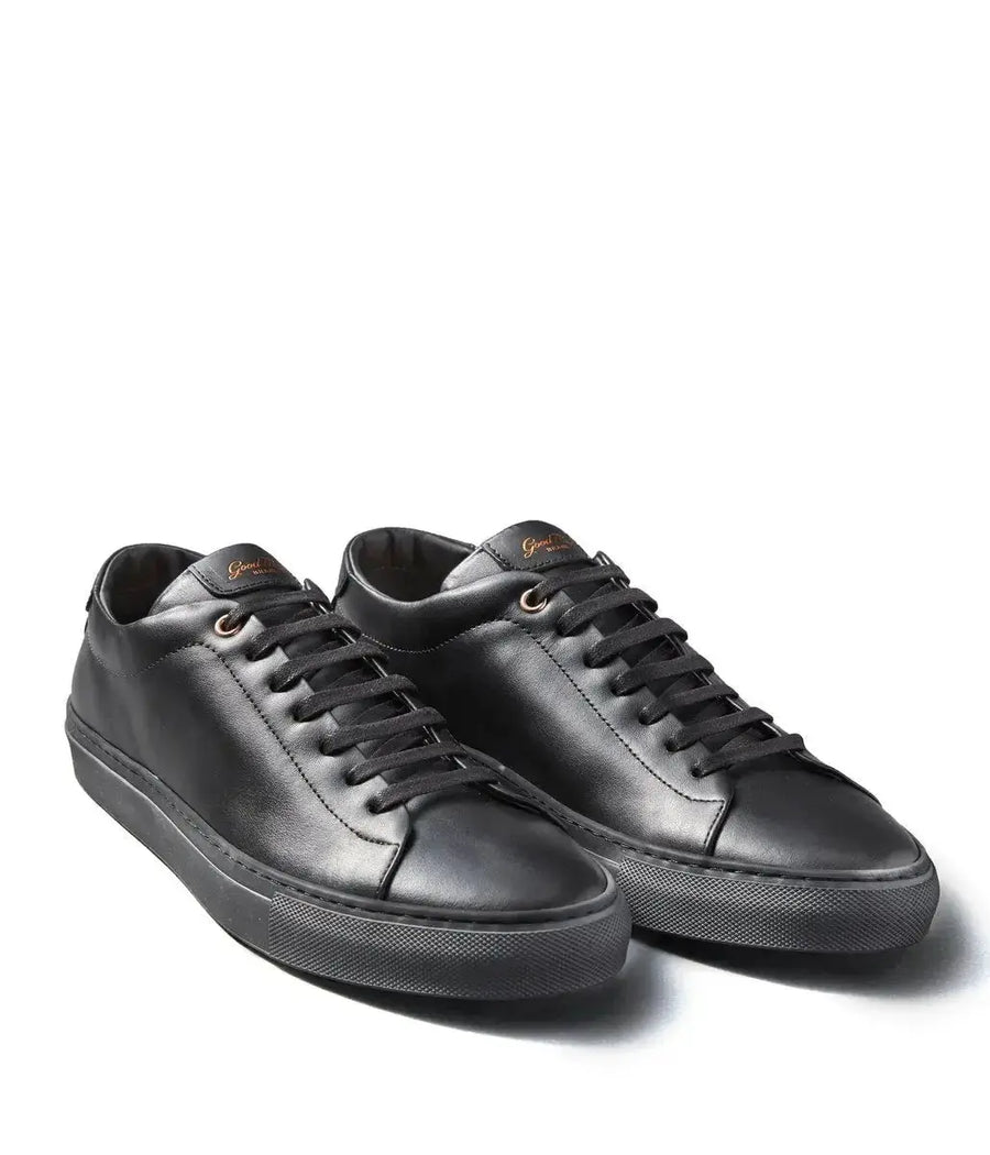 All black top brand shoes